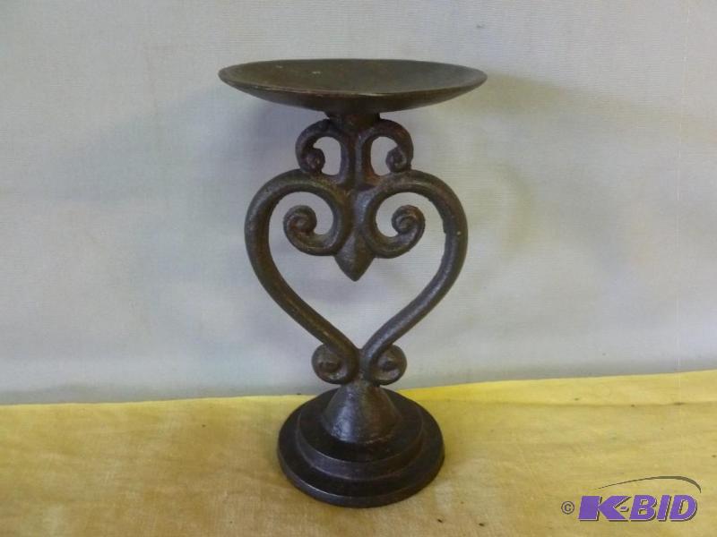 lot 143 image: Cast iron pillar candle holder, measures 7&qu...