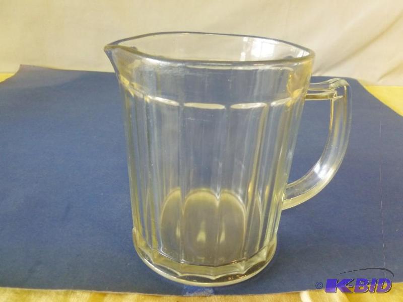 lot 148 image: Vintage Anchor glass milk pitcher that measur...