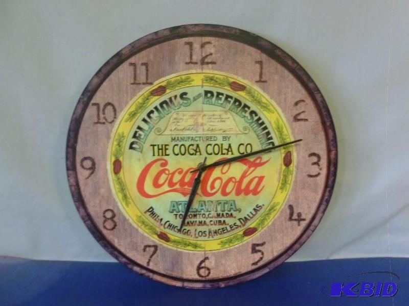 lot 156 image: Collectible Coca-Cola battery operated wall c...