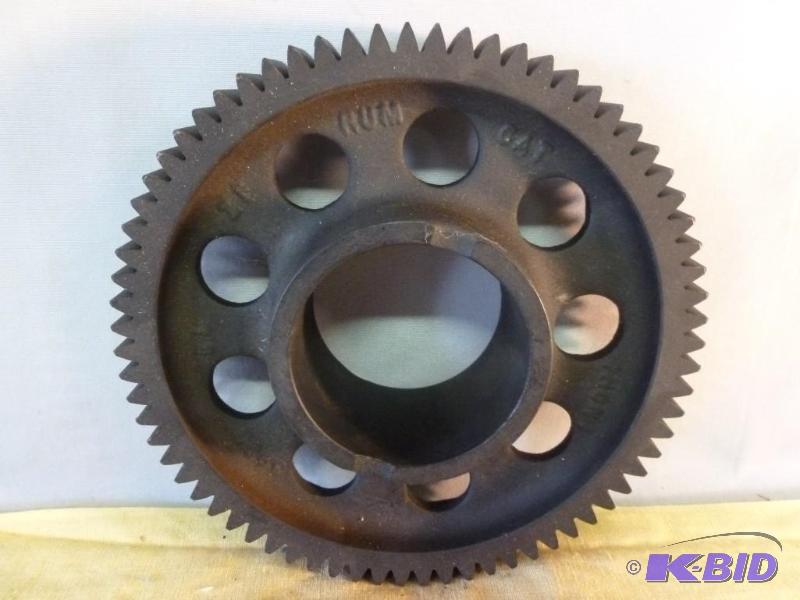 lot 180 image: Large steel gear that measures 7 34" ac...