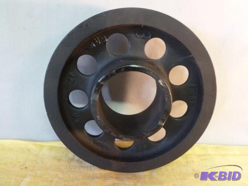 lot 181 image: Large steel pulley that measures 7 34"...