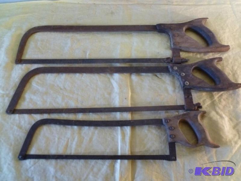 lot 183 image: Lot of three vintage wood handled meat saws....