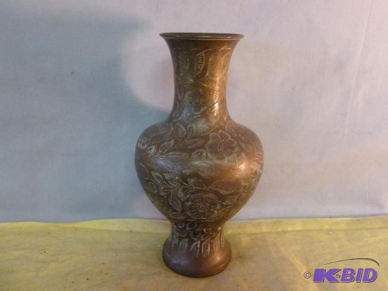 lot 201 image: Large vintage etched brass vase that measures...