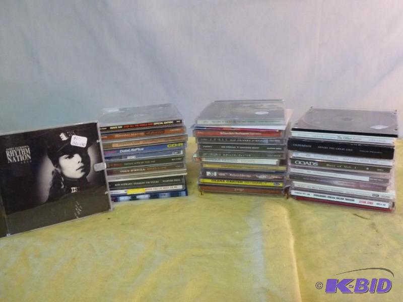 lot 212 image: Large lot of thirty-two music cds....