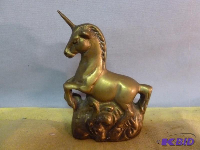 lot 224 image: Vintage cast brass unicorn decoration that me...