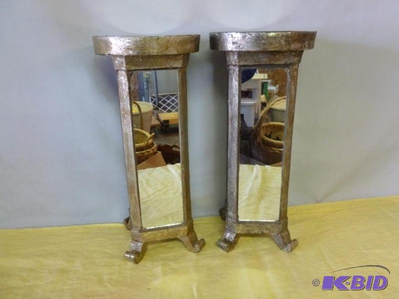 lot 38 image: A pair of large four sided mirrored display s...