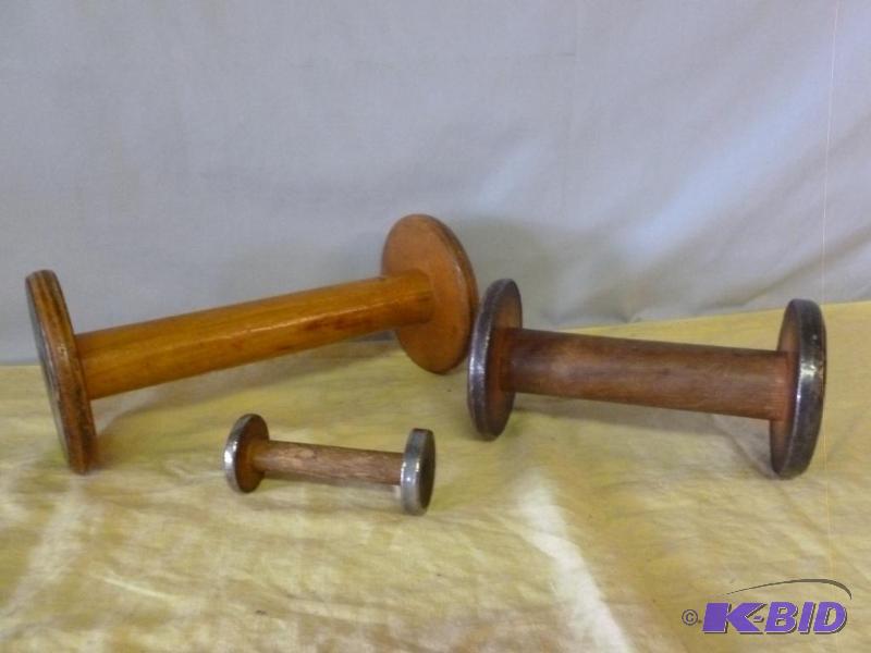 lot 62 image: Lot of three large vintage wooden spools that...
