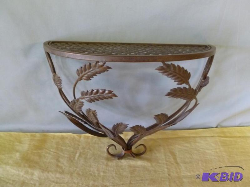 lot 66 image: Beautiful cut metal wall shelf that measures ...