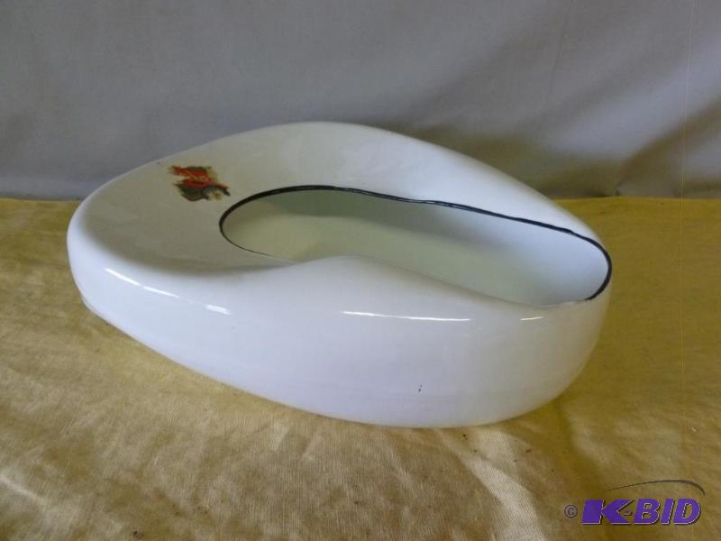 lot 70 image: Vintage Jones Metal Co. Relax 500 porcelain b...