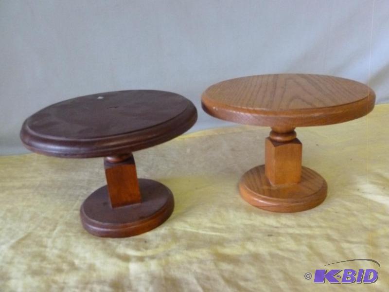 lot 71 image: Lot of two wooden plant stands that measure 9...