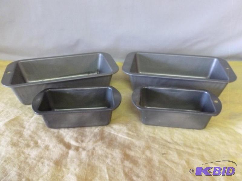 lot 77 image: Lot of four bread pans that includes two larg...