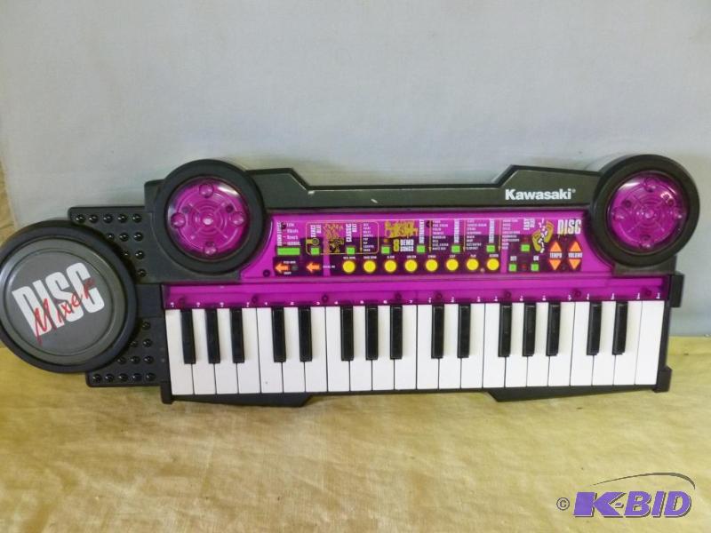 lot 95 image: Kawasaki battery operated keyboard, appears t...