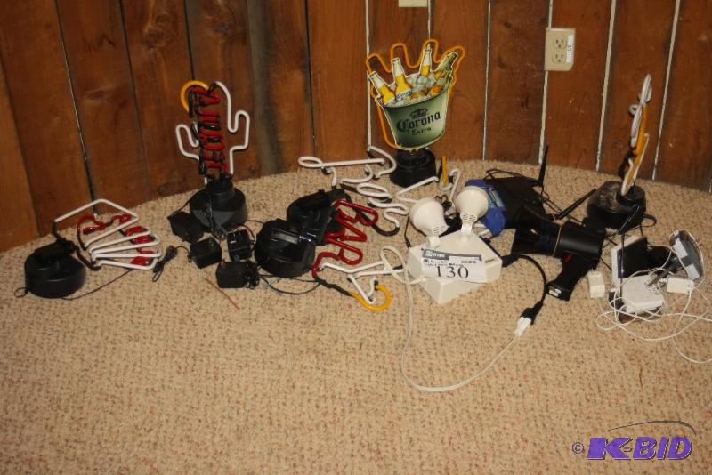 lot 130 image: (13) Decorative Signs Including Neon Bar Sign Neon Corona Sign Lutron Repeaters And More.