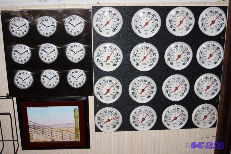 lot 131 image: (2) Wall Hangings wMeters Including Times of The World Temperatures of The World.
