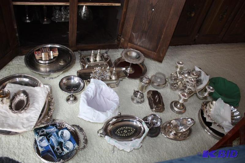 lot 137 image: Contents of Cupboard Including Silverware Trays Silverware Candle Holder Silverware Pots.