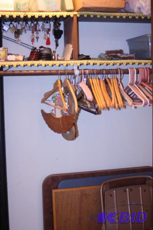 lot 155 image: Contents Of Closet Including Coat Hangers Pad Locks & Keys Bike Locks And More.