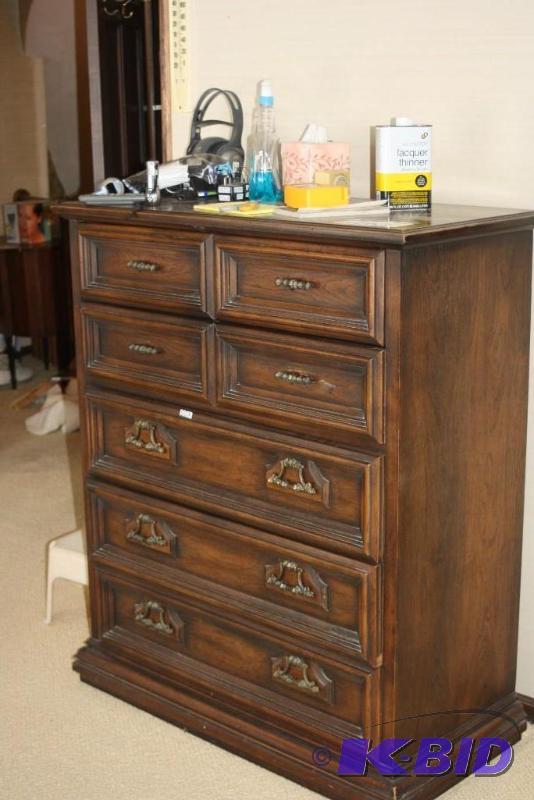 lot 163 image: (2) Wooden Dressers One Includes A Mirror Wooden Backing Includes Contents.