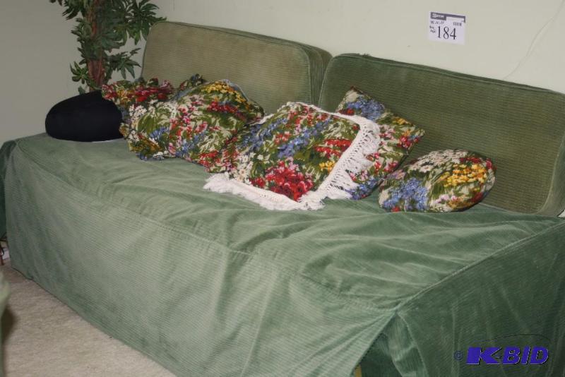 lot 184 image: Day Bed wCushions & Throw Pillows Includes Fake Plant & Bed Sheet.
