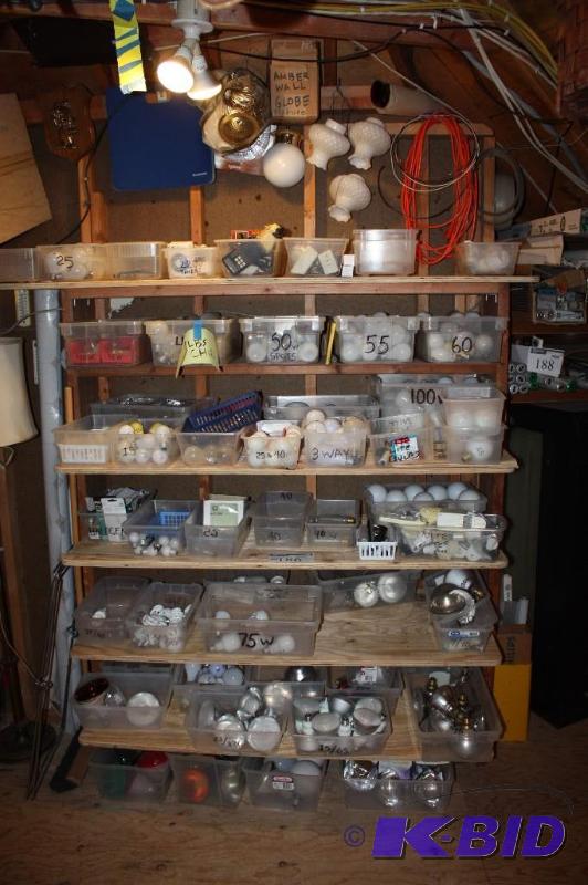 lot 186 image: Shelf & Wall Lot of Light Bulbs Including Incandescent Bulbs And More.