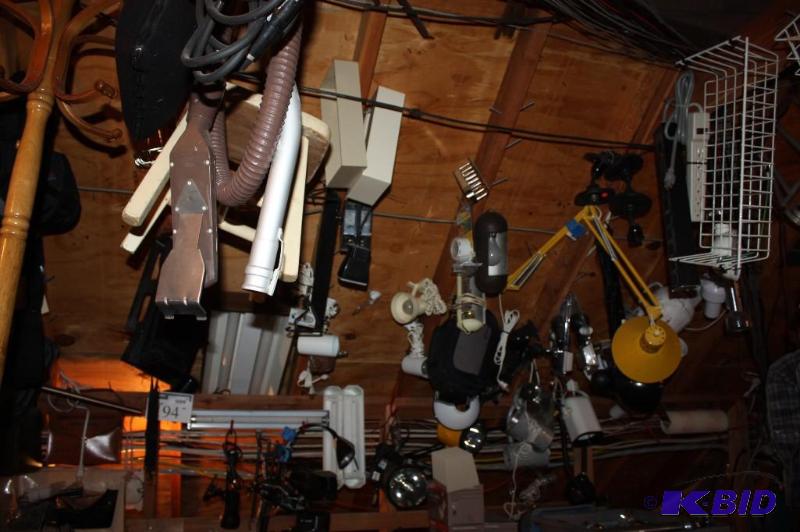lot 194 image: Above Shelf Lot Including Fluorescent Light Fixtures Rabbit Trap Flash Light And More.