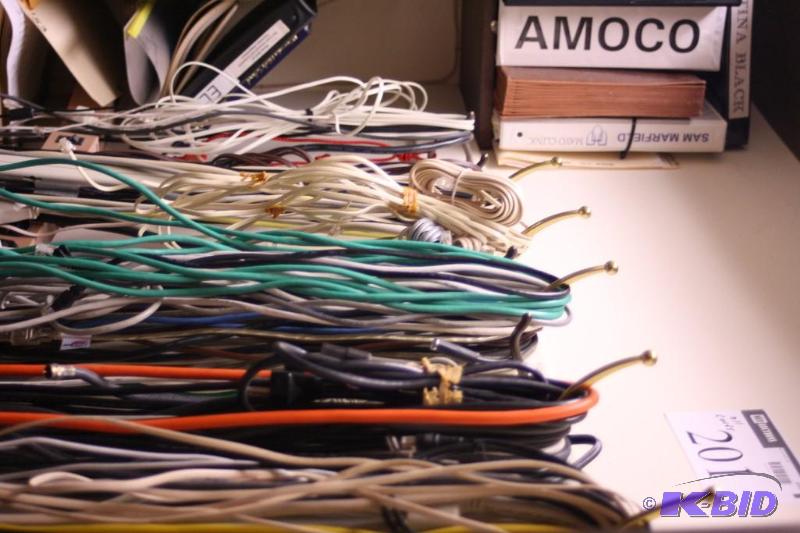 lot 201 image: Wall Lot of Miscellaneous Cords Does Not Include Hangers.