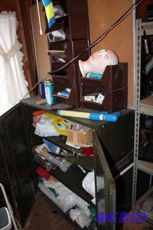 lot 209 image: Metal Cabinet Lot Including Metal Cabinet wDoors Plastic Bins Squirt Gun MiscellaneousHomeGoods