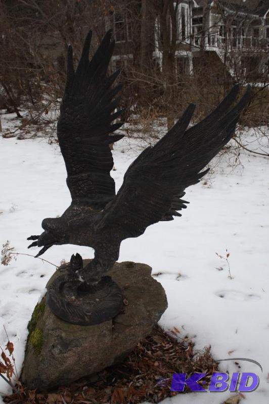 lot 24 image: Eagle Statue Made wBeverage Cans From Mexico 38 Wide 60 Height.