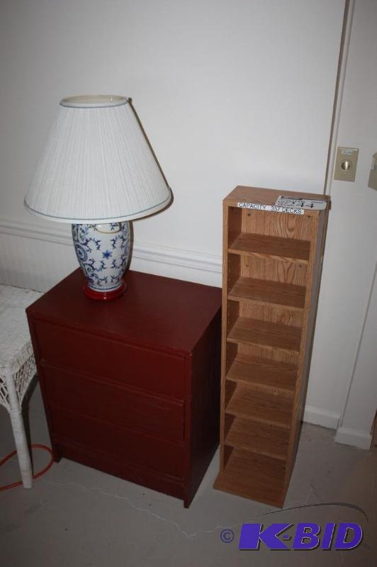 lot 244 image: (3) Including Vintage Lamp wOrnamental Base Red Wooden Dresser w3Drawers Wooden Shelf And More