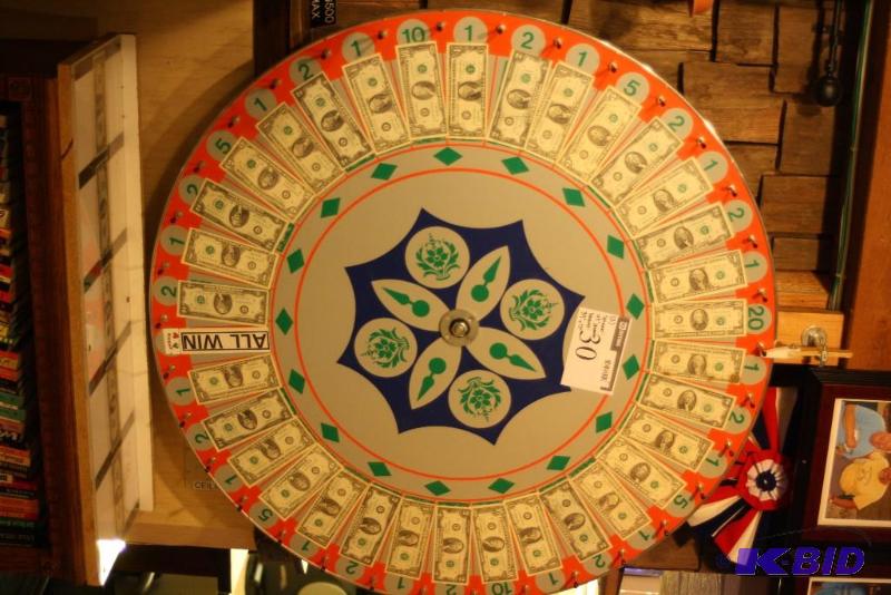 lot 30 image: Spinner Gambling Game Custom Gambling Game Includes Real Dollar Bills.