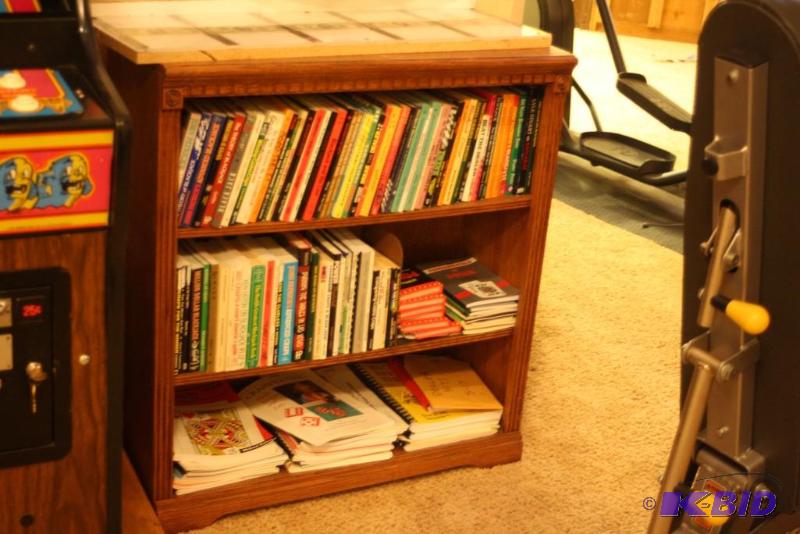 lot 31 image: Wooden Bookshelf wBooks 33 x 13 x 36.