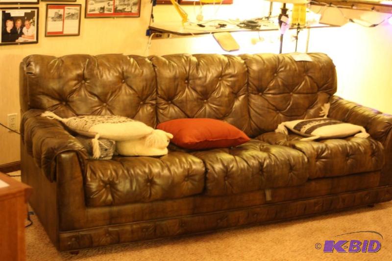 lot 32 image: Leather Couch Includes Contents Button Back Throw Pillows 84 x 36 x 33.