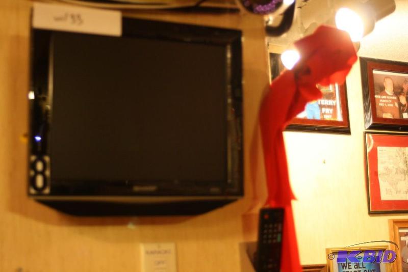lot 33 image: Lot of (2) Flat Screen LG Monitors & Wall Mounts Requires Tools For Removal.