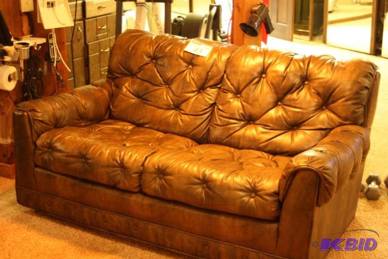 lot 43 image: Brown Leather Couch 2-Seater Button-Back Upholstery 60 x 36 x 33.