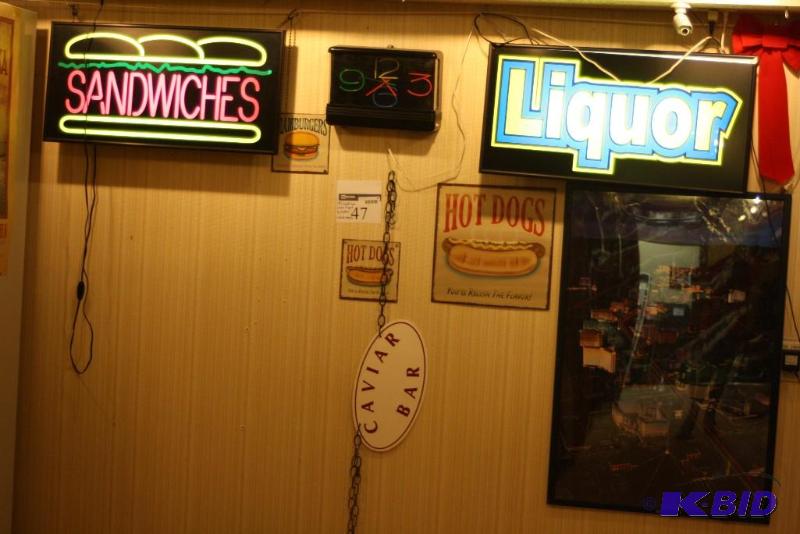 lot 47 image: (8) Decorative Posters & Neon Signs Including Sandwiches Neon Sign, Liquor Neon Sign, Hot Dog Sign