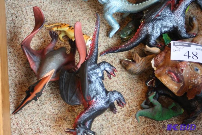 lot 48 image: (20) Toys Including Toy Dinosaurs, Toy Faces, Stuff Doll, And More.
