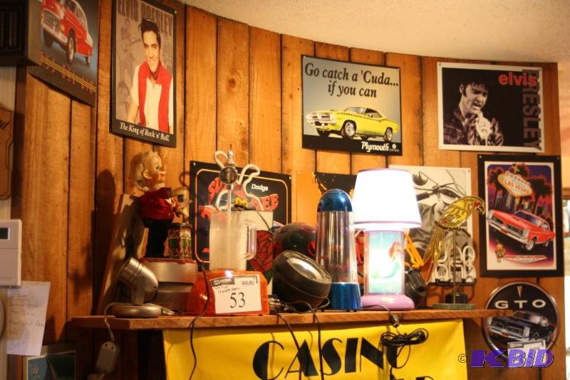 lot 53 image: Shelf Lot Includes Neon Signs Decorative Fish Lamps Stained Glass Lamp And More.