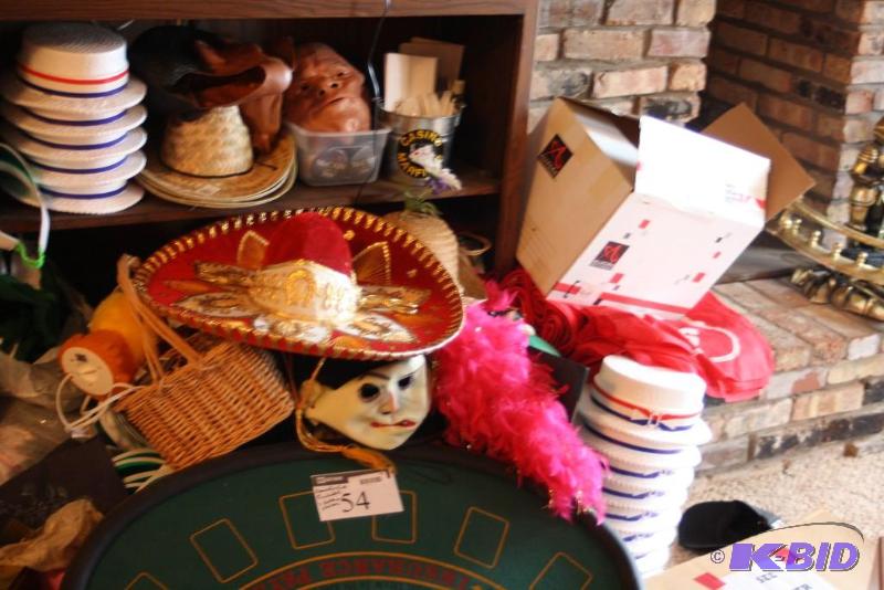 lot 54 image: Corner Lot of Party Supplies Includes Riverboat Gambling Hats Sombrero Masks And More.