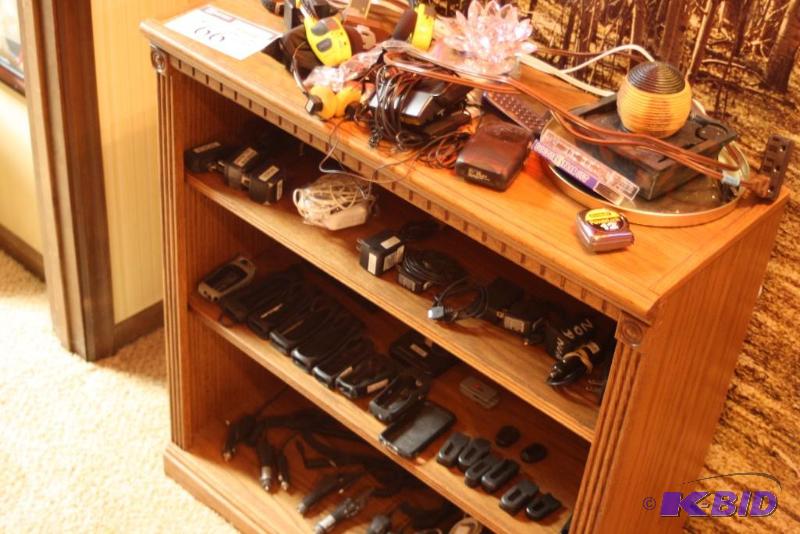lot 66 image: Shelf Lot Includes Wooden Shelf Cell-Phone Holsters Cell-Phone Cords And More.