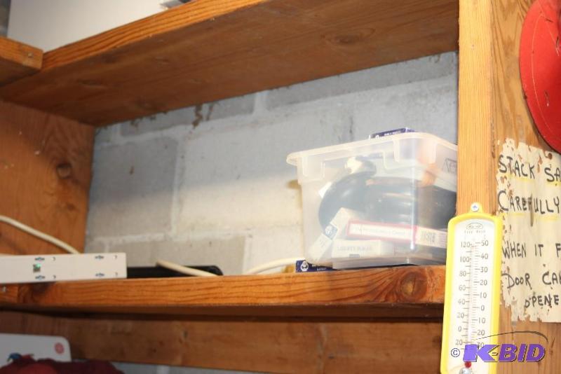 lot 75 image: Shelf Lot Including Bin of Calculators, Rulers, Incandescent Light Bulbs, And More.