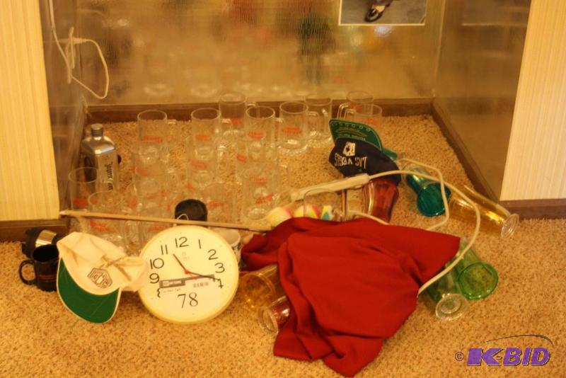 lot 78 image: Corner Lot Including Miscellaneous Party Supplies Glass Mugs Clock And More.