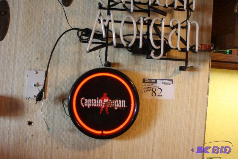 lot 82 image: (2) Captain Morgan Beer Sign Captain Morgan Clock Tested & Operational.