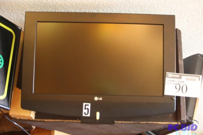 lot 90 image: Lot of (2) Flat Screen LG Monitors & Wall Mounts Requires Tools For Removal.