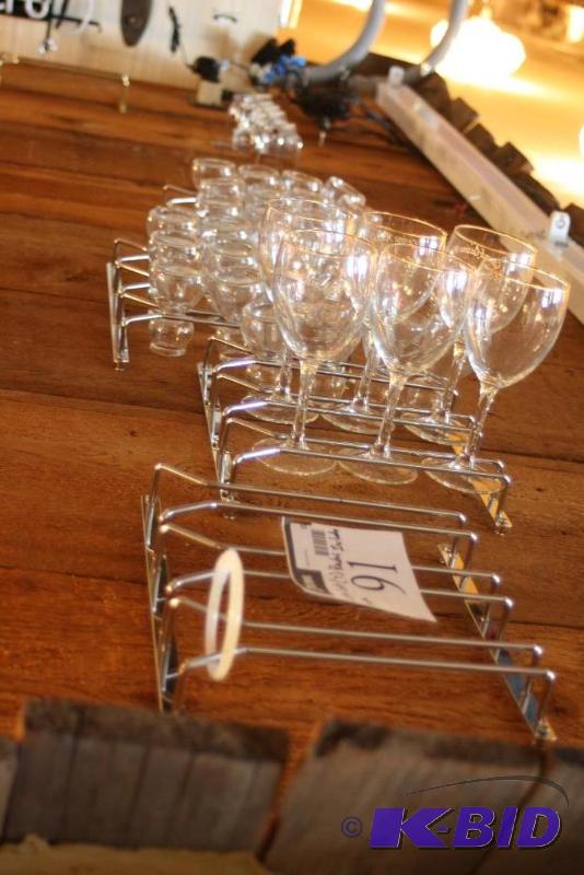 lot 91 image: (7) Metal Racks wMiscellaneous Bar Glassware Unique Bar Glasses Including Wine, Shots, And More.
