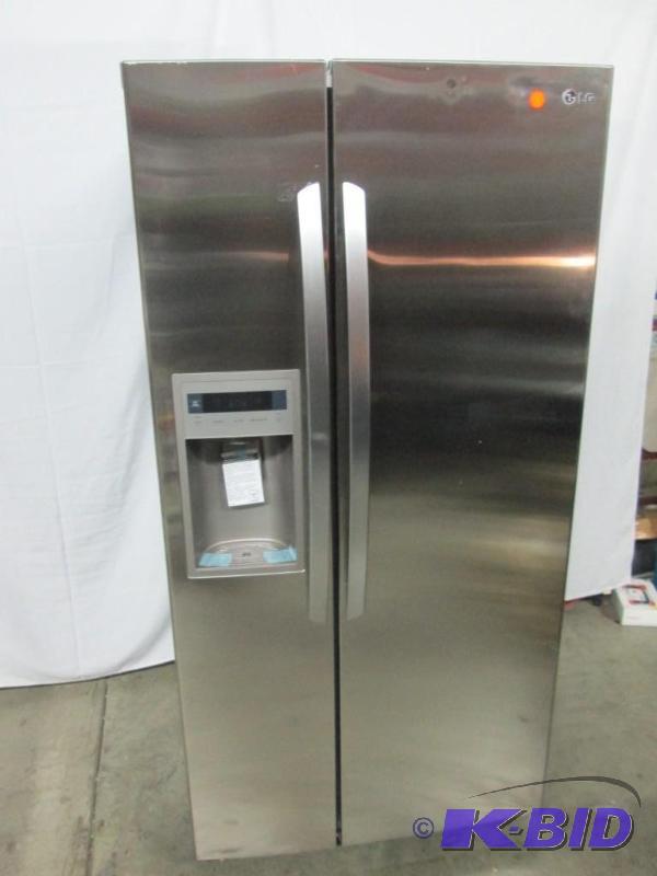 lot 1 image: LG Large Side-by-Side Refrigerator w Ice and Water