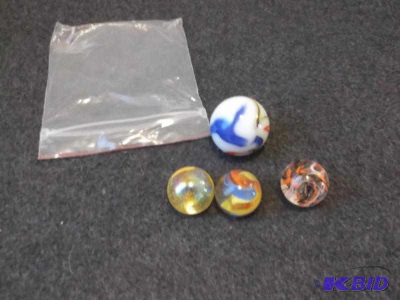lot 31 image: Nice lot with 3 shooters & 1 jumbo marble...