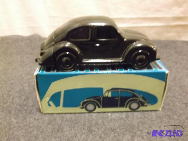 lot 63 image: Vintage Avon Volkswagen electric pre shave lo...