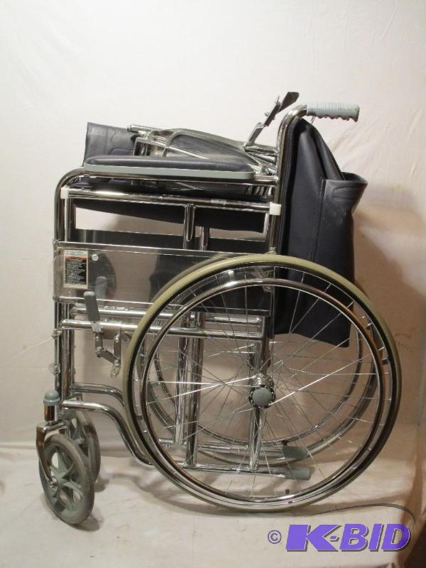 lot 42 image: 24 Foldable Wheelchair