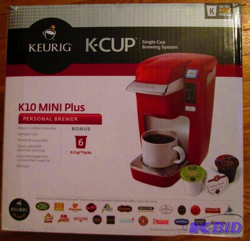 lot 10 image: Red Keurig k10 MINI Plus single cup coffee br...