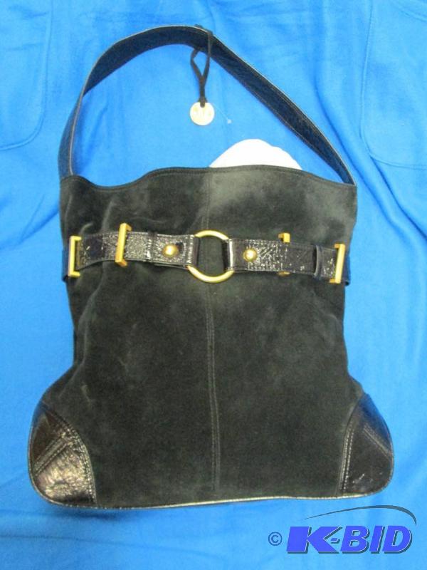 lot 28 image: Black ladies purse...