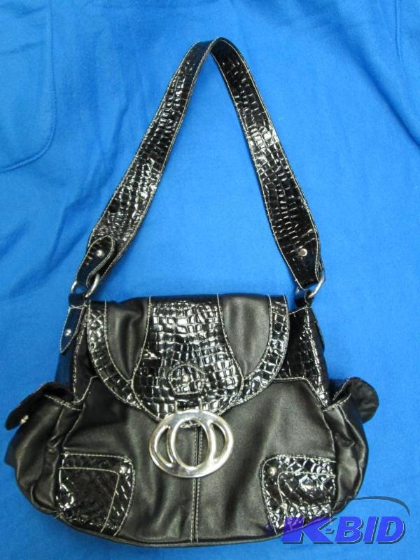lot 29 image: Ladies black purse...